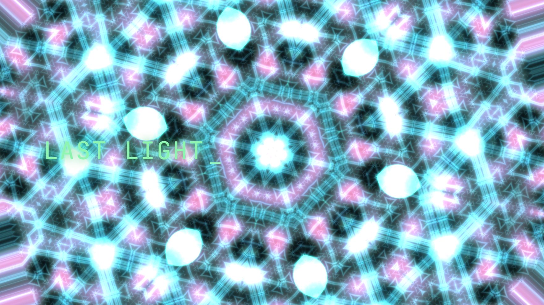 A live Phaselight output frame — a cyan and magenta kaleidoscope with the words LAST LIGHT typing on in green